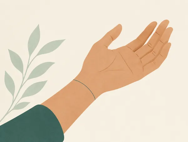Illustration: A wrist and open hand, palm up, a fine line running through the wrist